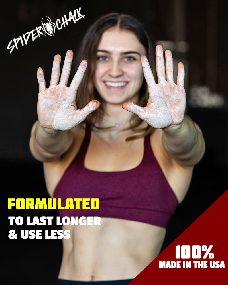 climber girl with chalk on hands
