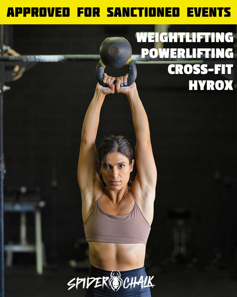 workout girl with kettlebell in gym wearing a sports bra