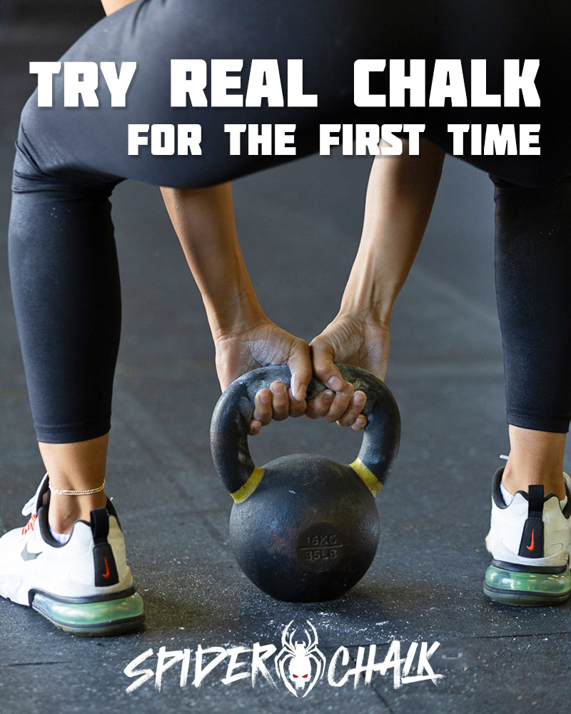 holding a kettlebell with hands about to swing